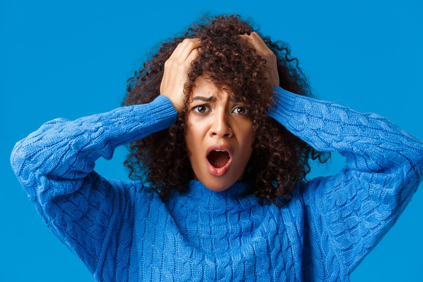 close-up-portrait-embarrassed-shocked-panicking-young-woman-made-huge-mistake-regret-it-staring-alarmed-nervous-standing-by-blue-wall_1258-35457